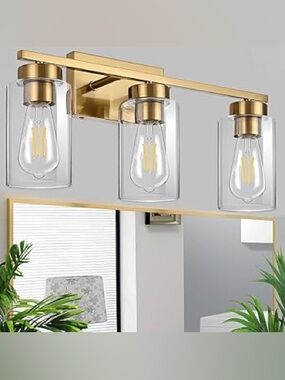 Brass Three-Light Track Wall Fixture - Gold Finish. Lightbulbs not included.